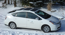 car with solar panel on roof